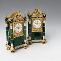 Pair of Vintage Gilded Clocks With Green Glass Panels And Ornate Finials