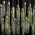 Modern Elegant Chandelier With Glass Tubes Golden Bases And Green Plants For Contemporary Interior Decor