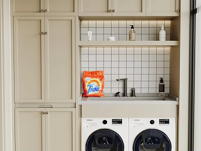 Modern Laundry Room With Dual Washing Machines Cabinets Tile Backsplash And Tide Detergent 3d model