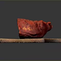 Fresh Raw Red Chicken Piece Placed On Wooden Cutting Board Under Studio Lighting