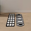Stylish Black and White Patterned Area Rugs with Grid and Circular Designs on Wooden Floor