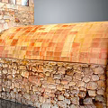 Traditional Architecture With Stone Wall And Arched Red Brick Tiled Roof