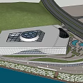 Modern Library Building with Glass Roof Design and Surrounding Water Feature Grass Area