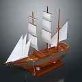 Detailed Wooden Sailboat Model Featuring White Sails and Brown Base Stand