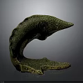 Decorative Green C Shaped Animal Sculpture With Spotted Surface And Holes