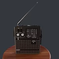 Sony Black Portable Radio With Antenna On Round Wooden Display Base