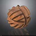 Orange Spherical Sculpture with Undulating Surface Texture and Warm Earthy Tones on Dark Reflective Background
