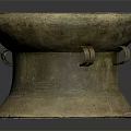 Vintage Brass Colored Drum Shaped Furniture Stool With Textured Surface And Decorative Handles