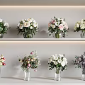 Multiple Glass Vases With Various Colored Flowers Arranged On Display Shelves