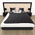 Double Bed With Beige Quilted Diamond Headboard Black Quilt Pillows Nightstands And Lamps