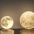 Elegant Moon Shaped Floor Lamps With Lunar Surface Texture And Soft Light In Two Sizes