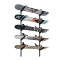 Variety Of Snowboards On Display Rack And Snowboard With Bindings