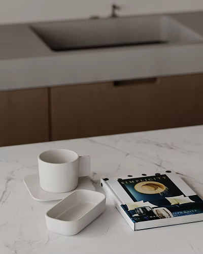 Minimalist Decorative Ornament Set With White Cup Coaster Small Dish And Book On Marble Countertop 3d model
