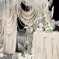Elegant Wedding Photo Spot With White Drapery Decorative Chandeliers Fresh Flowers Candles And Cake Tower