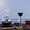 Living Essentials on Black Tray with Transparent Butterfly Vase Red Goblet and Gold Candle Holder