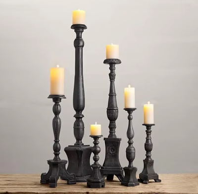 Black Candle Holders With Multiple Varying Heights And Lit Candles 3d model