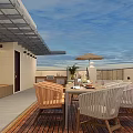 Cozy Outdoor Terrace With Wooden Flooring Table And Chairs Sunshade Umbrella And Flower Bushes