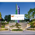 Industrial Science Popularization Park Landscape With Tall Tower Green Trees Circular Steps Railing And Lawn