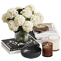 Decorative Ornament Set with White Hydrangea Glass Vase Books Black Bowl Gold Plate and Candles