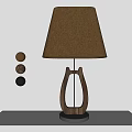 Wooden Base Table Lamp With Linen Shade And Three Spherical Decorations On Light Desk