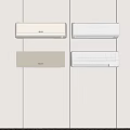 Four White Air Conditioner Fans Mounted on Light Colored Wall in Modern Interior Room
