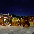 Traditional Commercial Street At Night With Traditional Architecture Lit Stalls Lotus Pond And People Walking