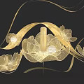 Golden Petal Art Installation With Illuminated Design Flowing Ribbons And Perfume Bottle Center