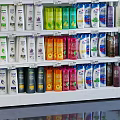 Retail Display Shelves With Multiple Tiers And Neatly Arranged Daily Necessities Products