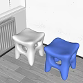 Shiny Modern Silver And Blue Stools In Indoor Corner With Light Floor
