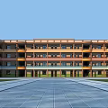Modern Multi Story School Building With Vibrant Exterior And Spacious Front Courtyard