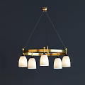 Modern Golden Metal Chandelier With Five White Lampshades And Glowing Lights