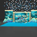 Launch Device Setup on Event Stage with Blue Carpet Backdrop and Balloons
