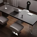 Modern Black Desk Workspace With Laptop Table Lamp Coffee Cup Notebook And Stools