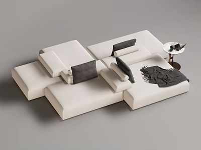 White Modular Sectional Sofa With Grey Cushions Side Table And Throw Blanket 3d model
