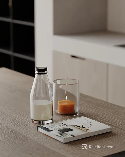 Decorative Ornament Set With Clear Glass Bottle Lit Orange Candle And Tabletop Magazine 3d model 