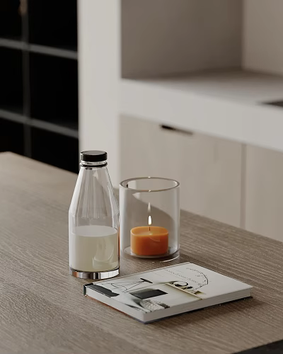 Decorative Ornament Set With Clear Glass Bottle Lit Orange Candle And Tabletop Magazine 3d model