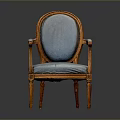 Classic Armchair with Carved Wooden Frame and Soft Blue Upholstered Seat