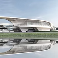 Modern Architectural Building With Streamlined Design Glass Facade Water Reflection And Surrounding Grassland