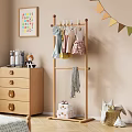 Wooden Storage Cabinet in Kids Room with Stuffed Toys Wooden Hanger and Alphabet Wall Decor