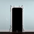 White Carved Classical Door Arch with Decorative Top against Light Blue Wall and Wooden Floor
