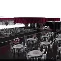 Wedding Banquet Stage With Pink Drapery White Tables Chairs And Flower Decorations