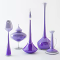 Elegant Glass Vases And Bottles With Gold Orange Pink Tones And Unique Shapes
