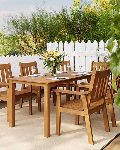 Wooden Dining Chairs With Dining Table Yellow Flowers And White Picket Fence In Garden 3d model