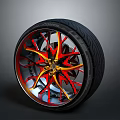 Stylish Car Wheel Rim With Red And Yellow Spokes And Black Tire