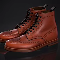 Stylish Orange Leather Brogue Boots With Black Laces And Intricate Patterns