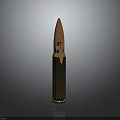 Isolated Shiny Metallic Bullet With Golden Casing And Copper Tip On Dark Background
