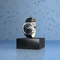 Luxury Black Watch Displayed On Black Square Base Against Blue Background With Blurred Light Spots
