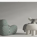 Modern Single Sofa With Green Striped Design Plush White Upholstery And Decorative Throw Blanket