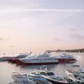 Multiple Luxury Yachts Moored On Calm Water With Larger Vessels And Cloudy Sky Background