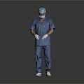 Male Medical Professional In Blue Surgical Scrubs With Cap Mask And Gloves